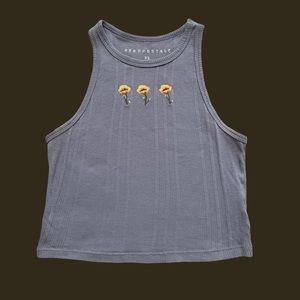 Periwinkle tank top with flower embroidery graphic
